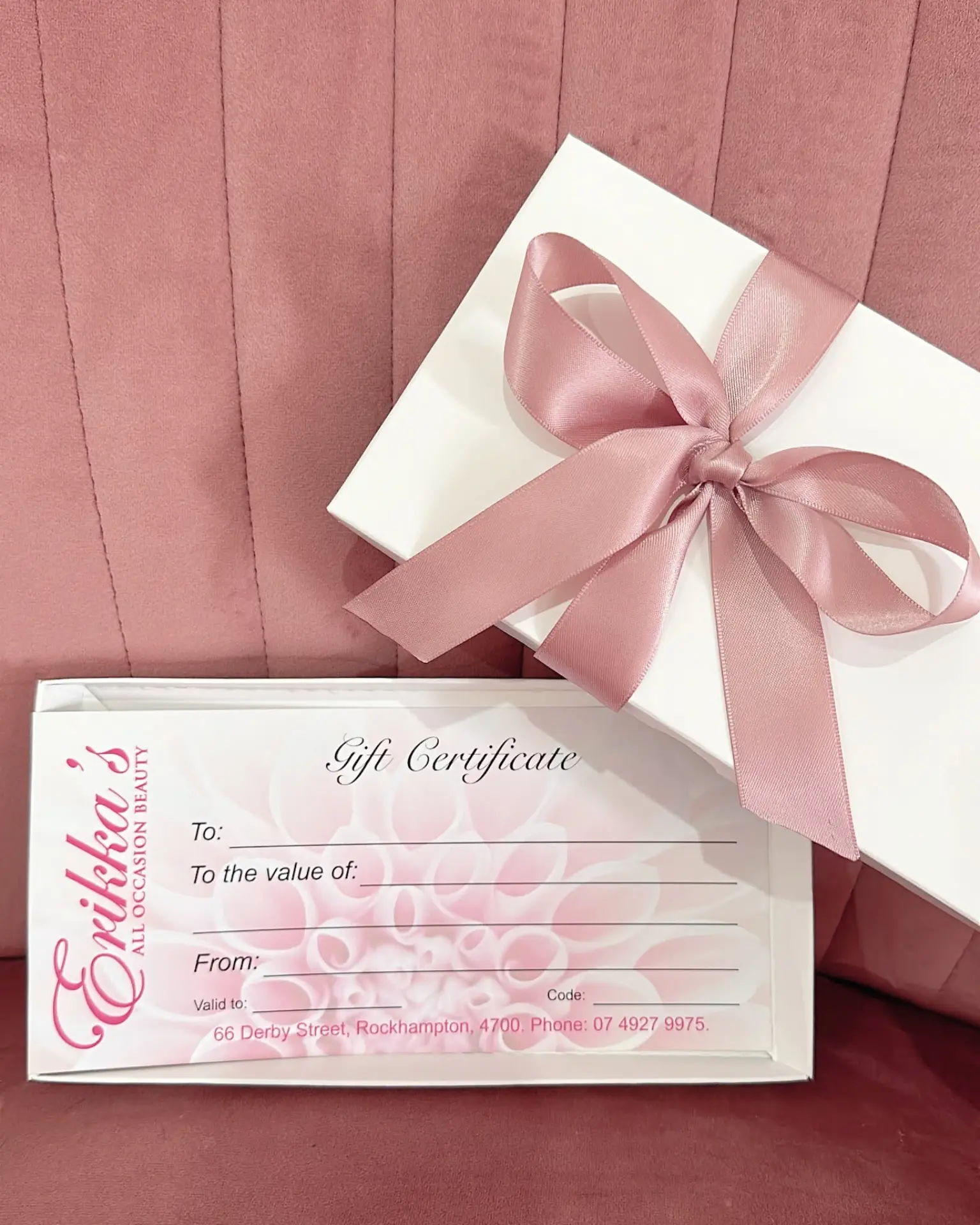 A wrapped Erikka's All Occasion Beauty gift certificate