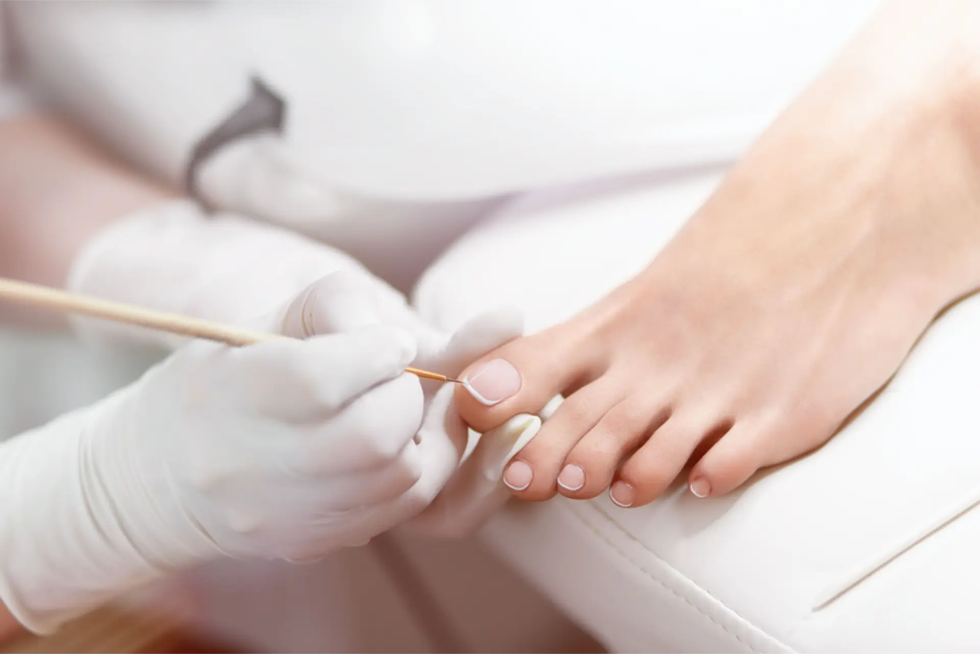 Close detail of a pedicure in progress